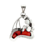 Back of silver pendant with red coral on a white background