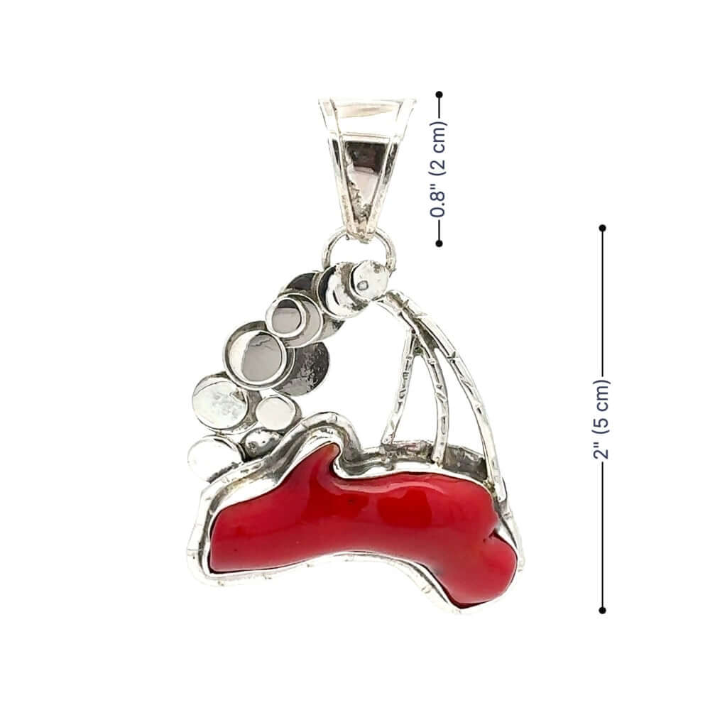 Silver and red coral pendant with measurements on a white background