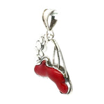 Silver pendant with a red coral center on a white background