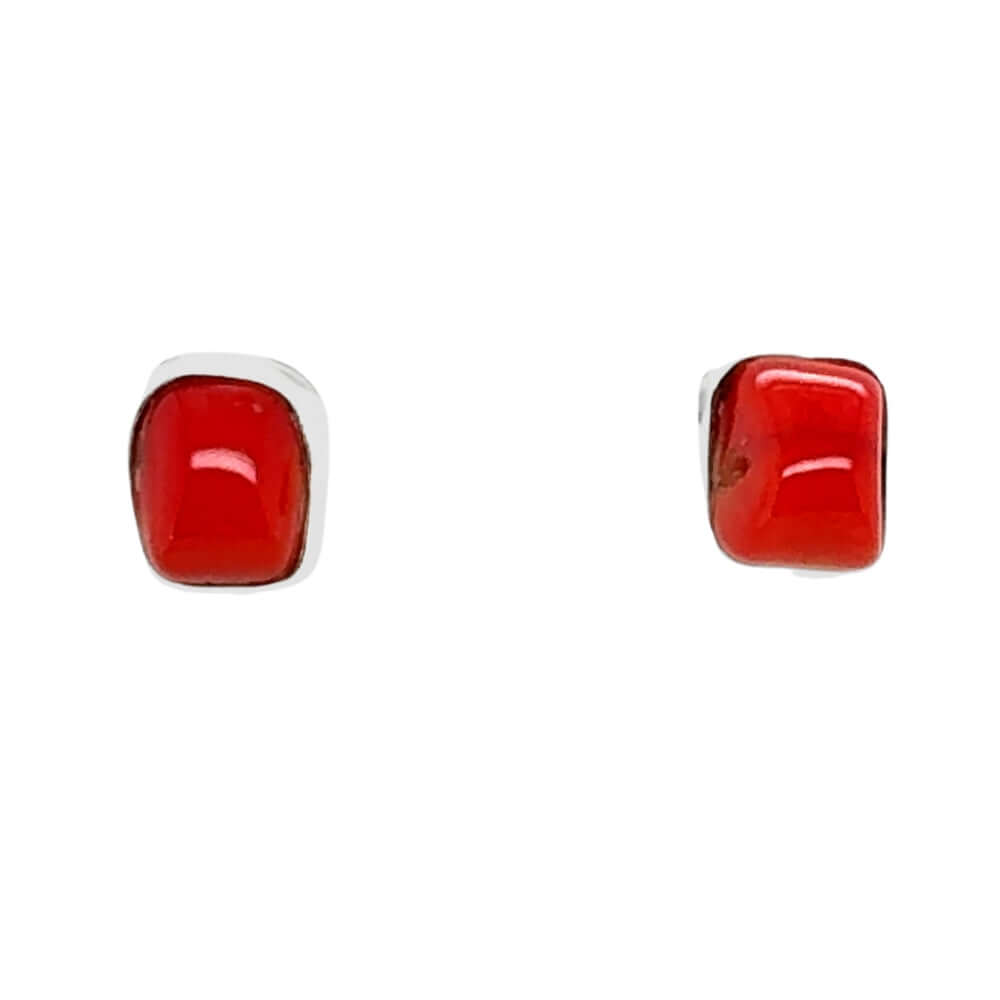 Pair of red coral square earrings on a white background