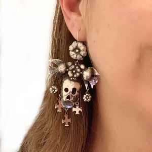Skull-with-Big-Birds-Silver-Earrings-with-model-Nueve-Sterling