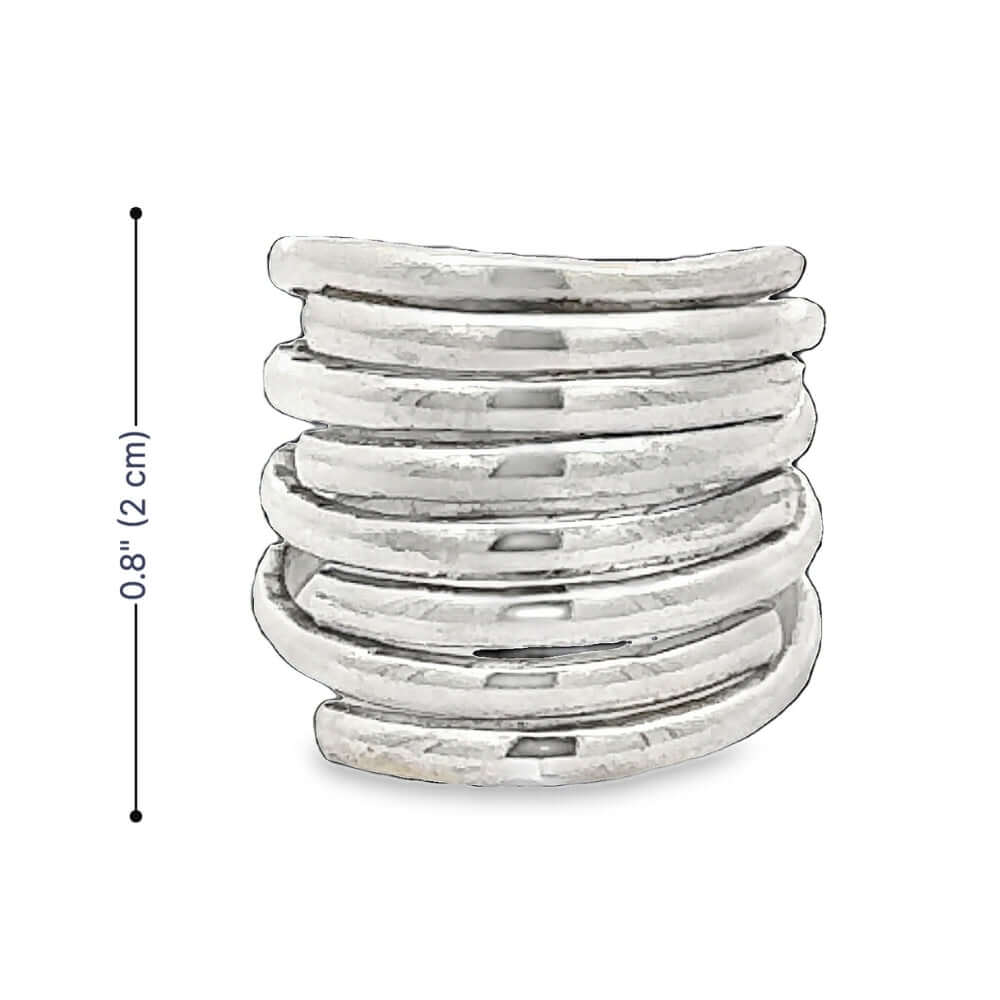 Stack of silver rings with a measurement label on a white background