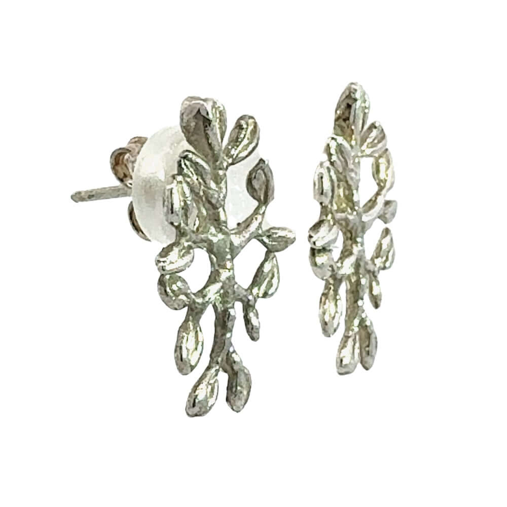 A pair of silver stud earrings shaped like textured leafy branches with small leaf-like buds, shown on a plain white background.