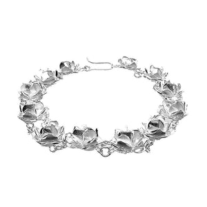 Taxco-Silver-Bracelet-with-Roses-front-Nueve-Sterling