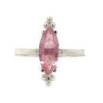 Pink gemstone ring with Taxco silver setting on a white background
