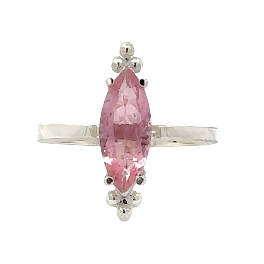Pink gemstone ring with Taxco silver setting on a white background