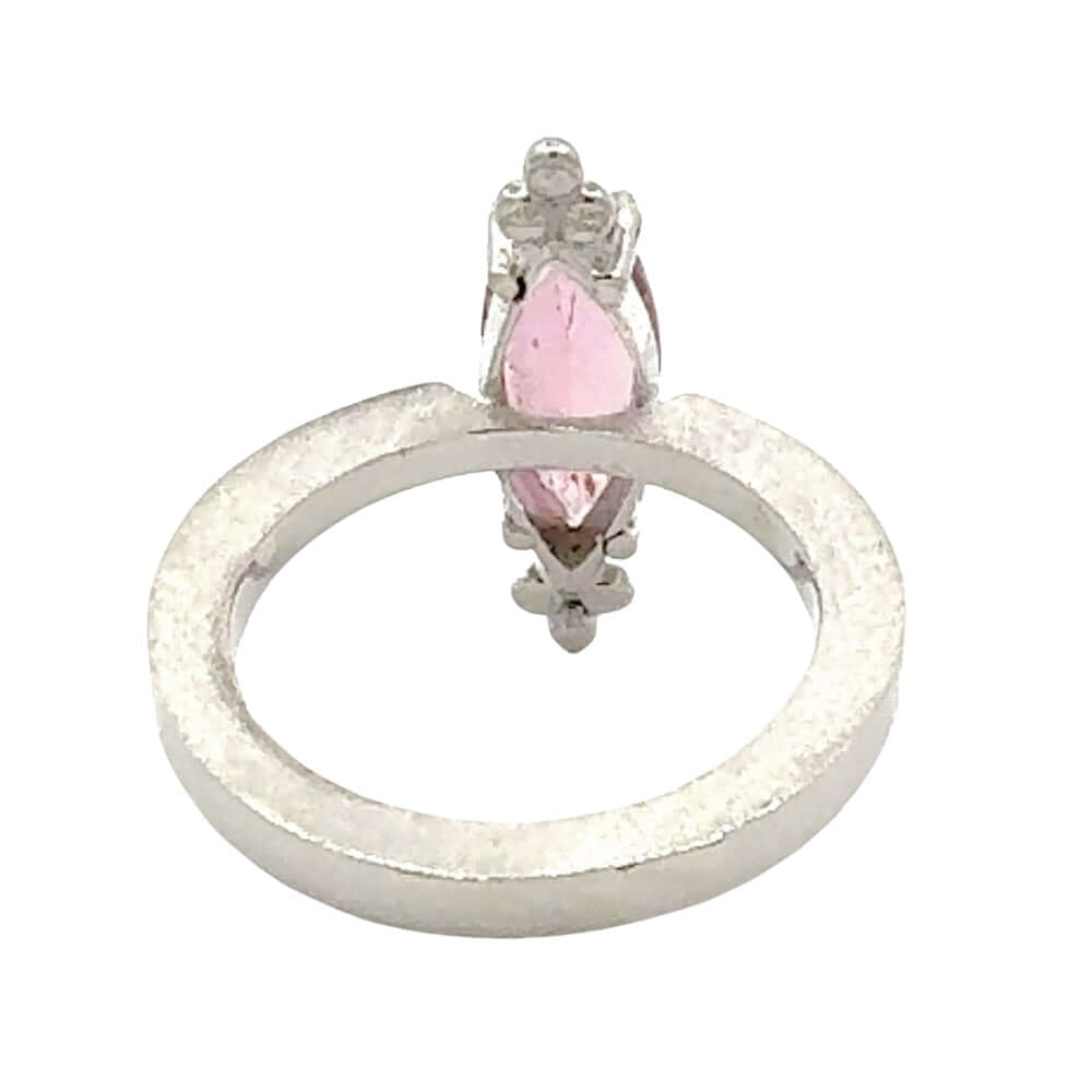 Back of a Taxco Silver ring with a pink gemstone on a white background