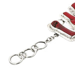 Close-up of a silver bracelet with coral on a white background