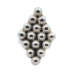 Adjustable sterling silver ring from Taxco with a geometric bead design on a white background.