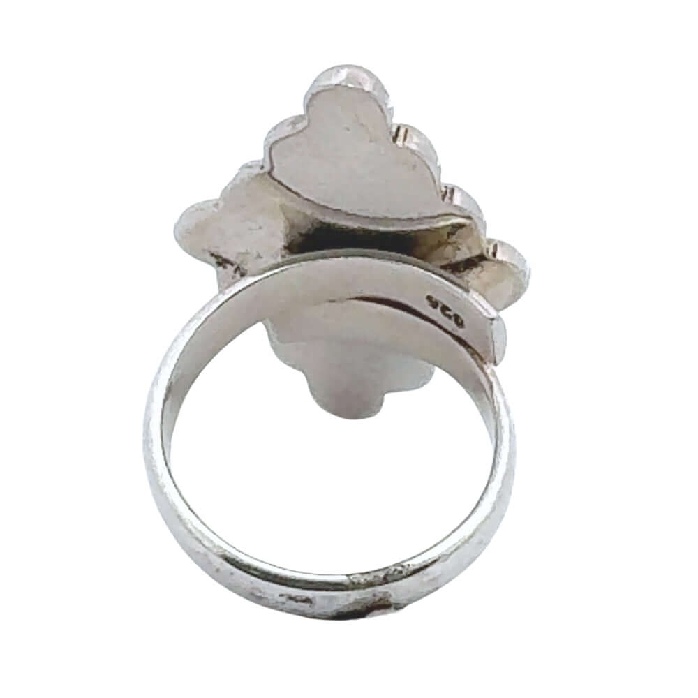 Back of Taxco silver ring with a geometric design on a white background