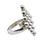 Taxco silver ring with bead design on a white background