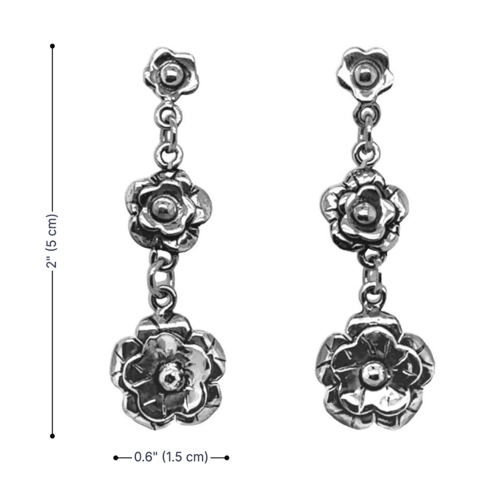 Silver floral earrings with measurements on a white background
