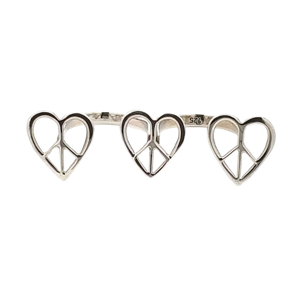 Silver bracelet with heart and peace symbol design on a white background