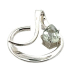 Close-up of the master craftsmanship and secure prong setting for the heat-treated green quartz stone.