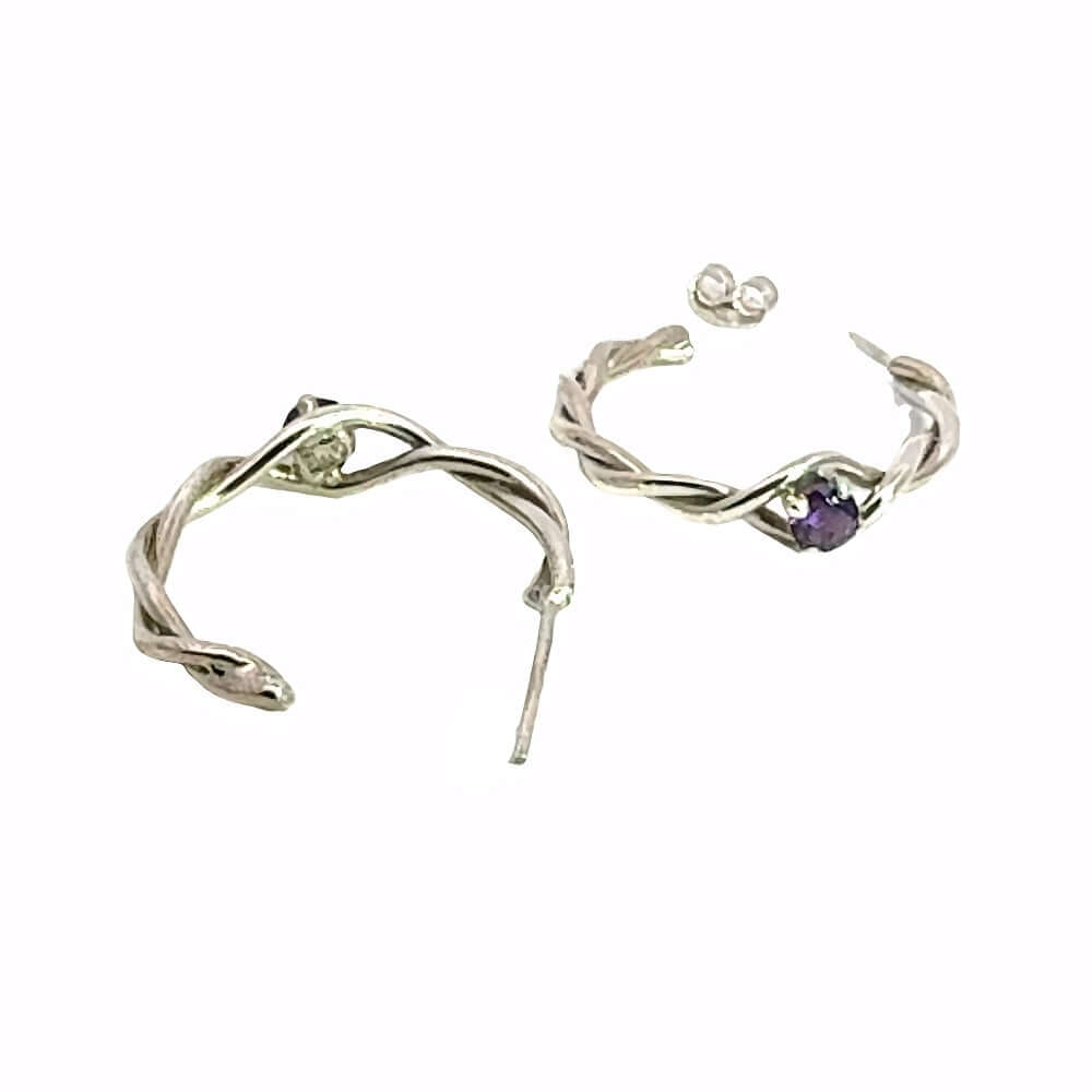 Two authentic Mexican silver hoop earrings with amethyst gemstones showing the delicate handcrafted texture