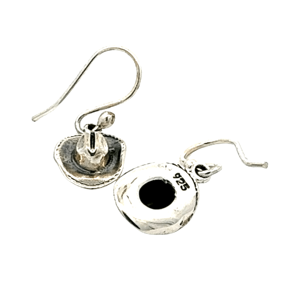 Close-up view of the back of the small earrings showing the secure 925 hallmark stamp and the smooth, hand-turned hook wire hardware.