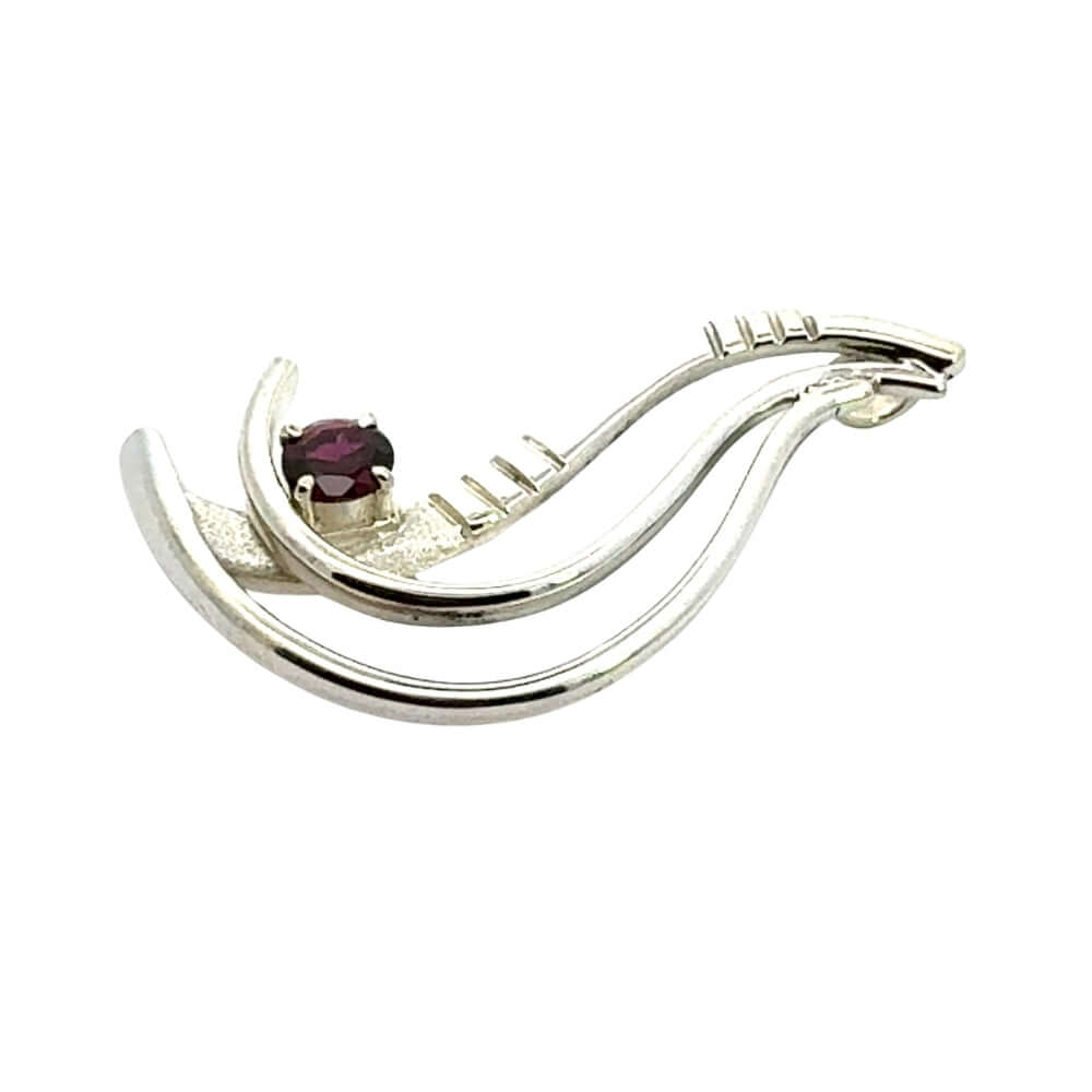 Detailed side profile of a custom-made 925 sterling silver and garnet pendant