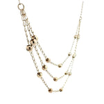 Detailed view of the texture on the silver bead chain necklace