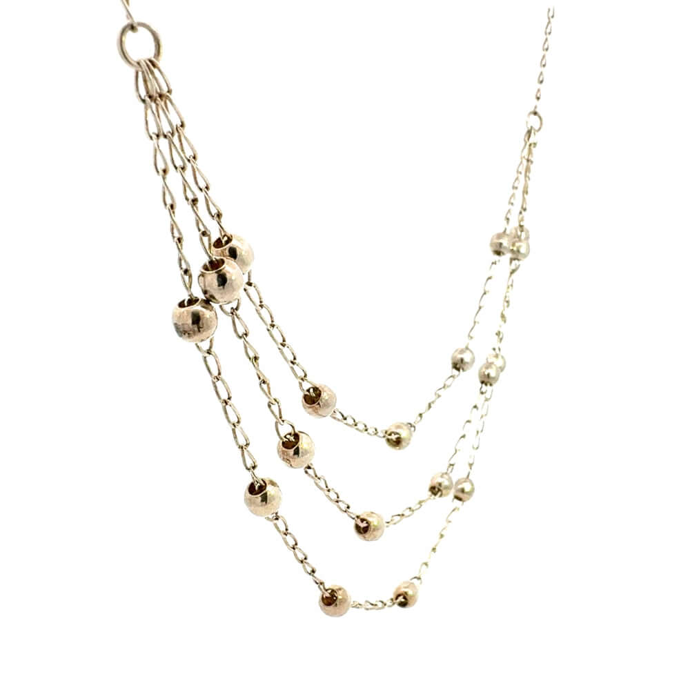 Detailed view of the texture on the silver bead chain necklace