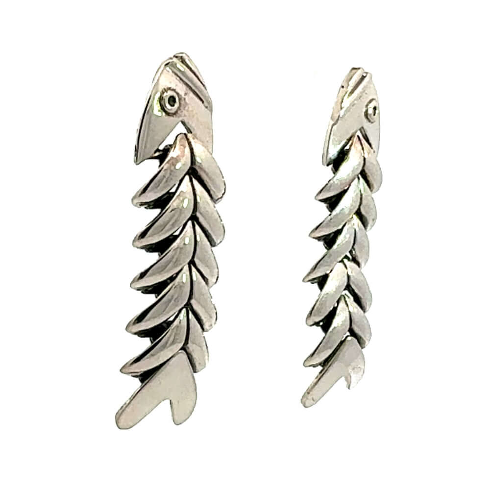 Side angle view of DMolina silver fishbone earrings.