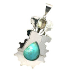 Reverse side of the handcrafted sterling silver elephant pendant displaying the smooth open-back stone bezel and bail attachment.