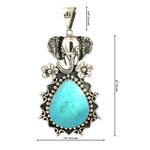 Dimension chart showing the elephant turquoise pendant measuring 3.1 inches long, 1.8 inches wide, with a 0.6-inch bail.