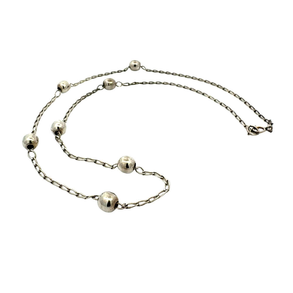 Taxco silver necklace with beads on a white background