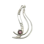 Front view of a handcrafted 925 sterling silver pendant with a natural garnet stone
