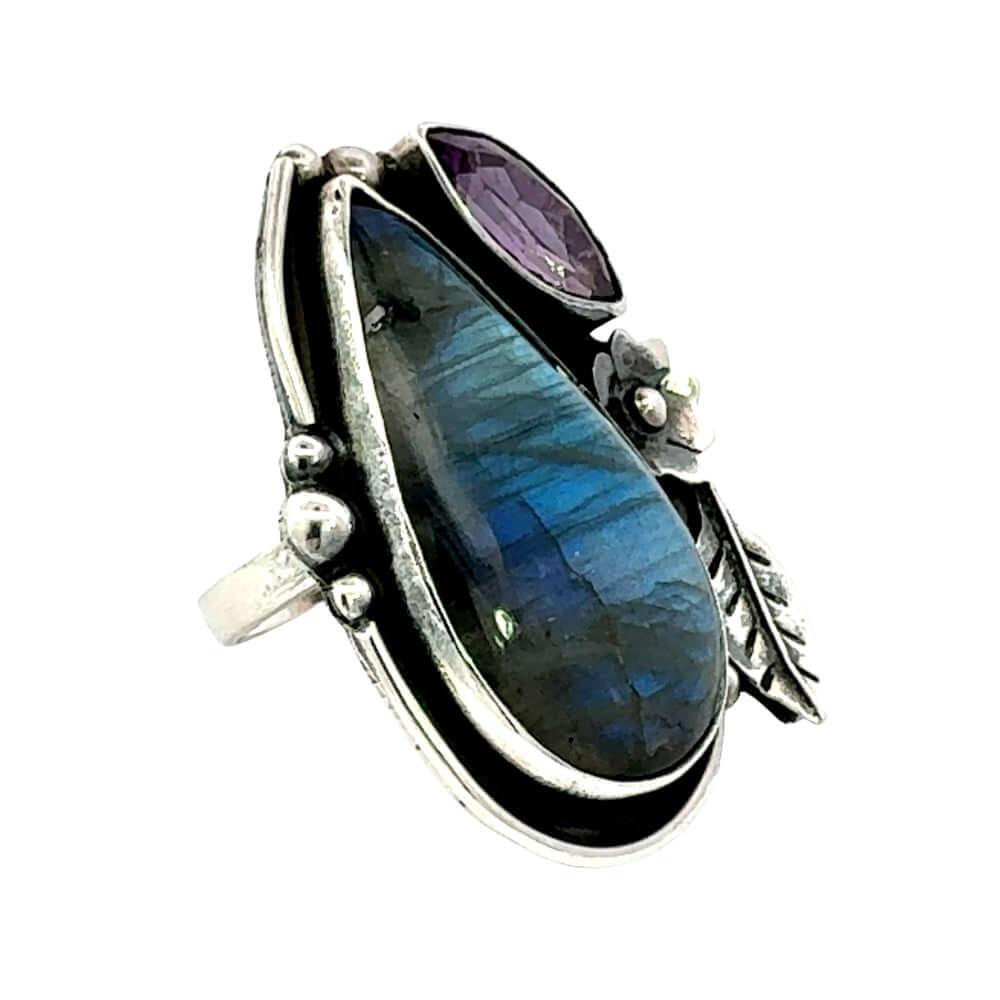 Side angle view showcasing the smooth bezel settings and architectural split band of the artisan chunky ring.