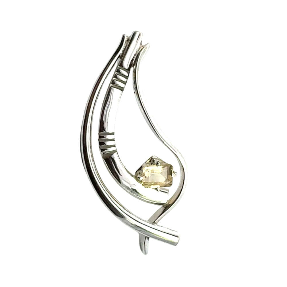 Front view of a handmade .925 sterling silver openwork pendant featuring a rectangular citrine gemstone.