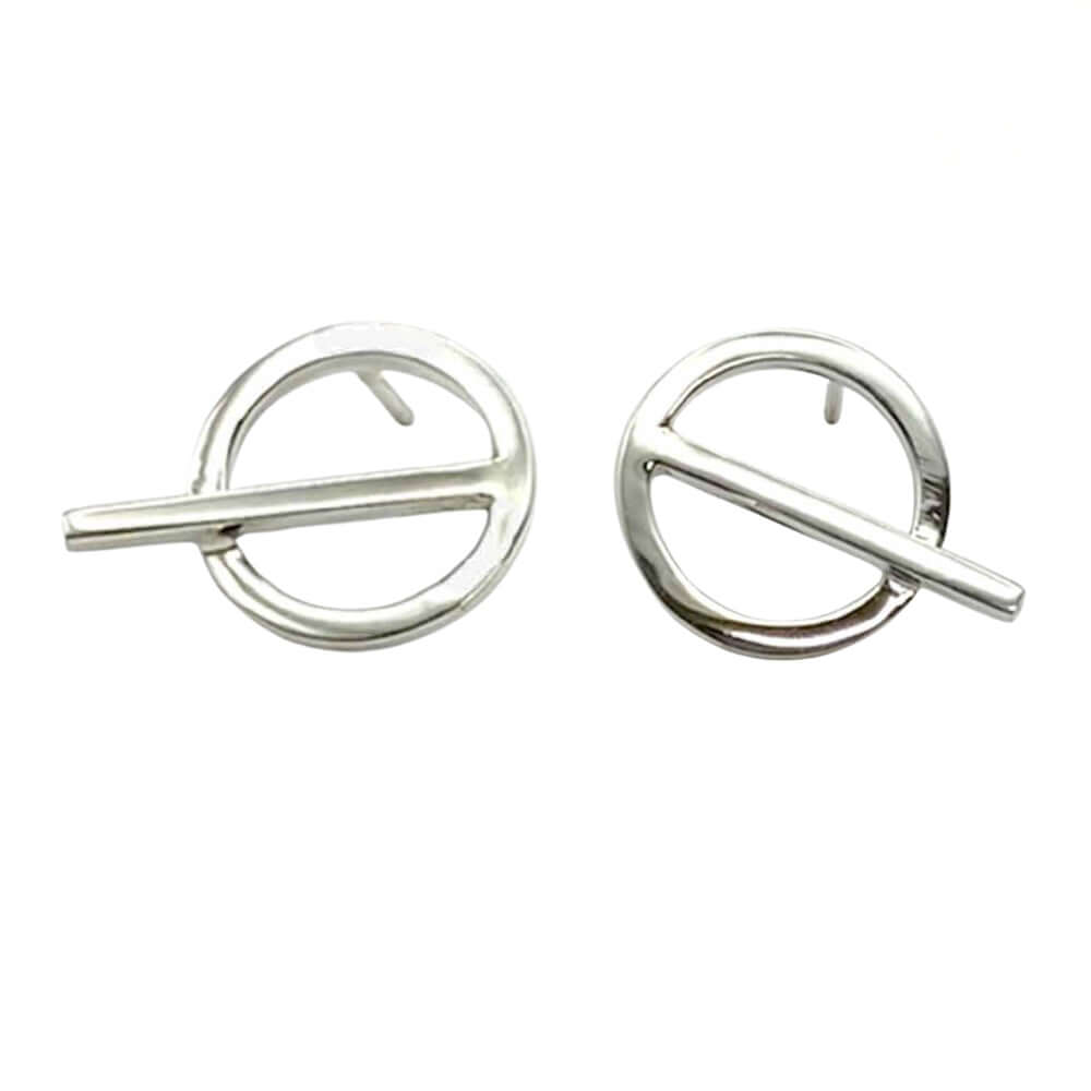 Pair of artisan sterling silver post earrings featuring a minimalist circle and bar design from Taxco