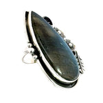 Side perspective of the ring highlighting the high-quality finish and comfortable, adjustable 950 silver design.