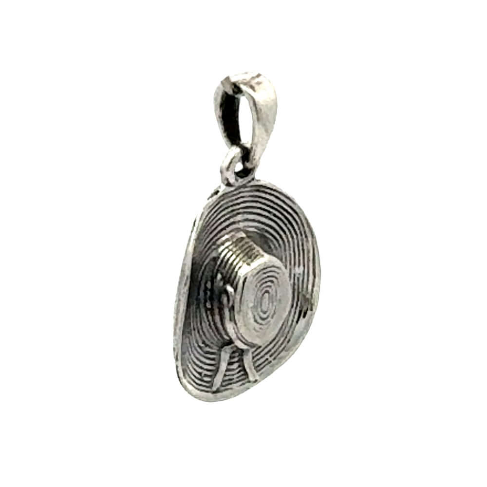 Perspective layout of the miniature silver striped cowgirl hat pendant highlighting the beautiful linear ridges on the brim.