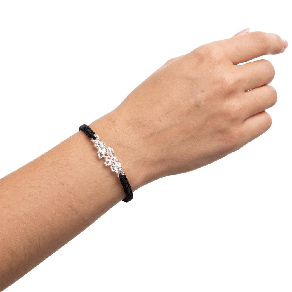 Woven silver caviar bracelet with model
