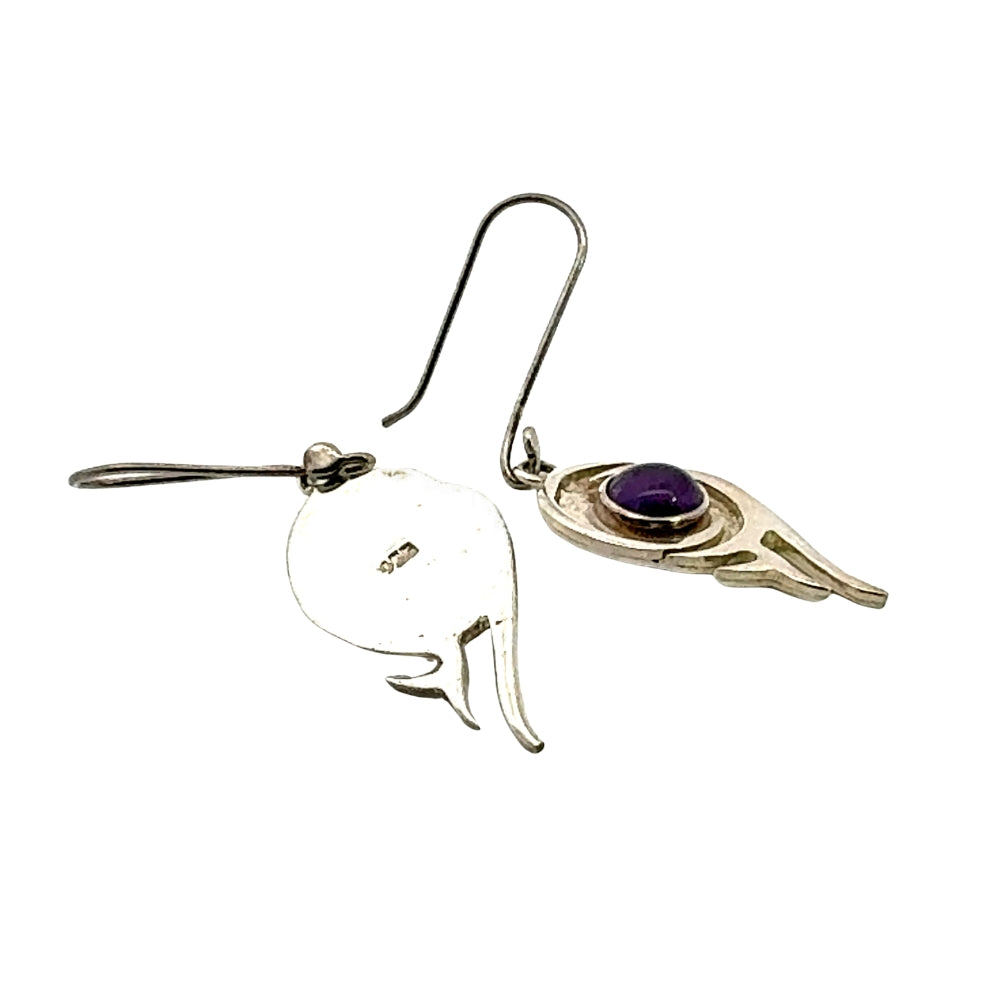 Side and back view of silver flame amethyst drop earrings showing French wire hook and 925 silver stamp.
