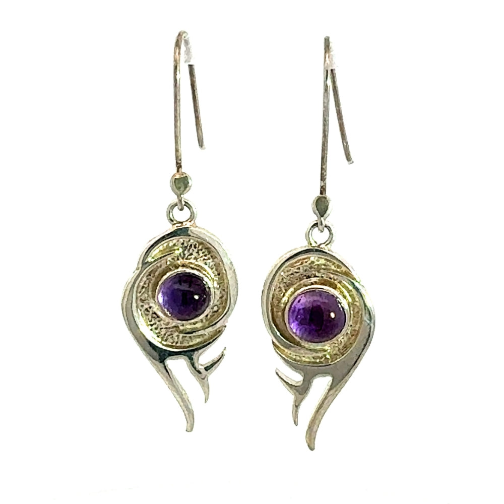 Pair of 925 sterling silver flame earrings with round purple amethyst center stone on white background.