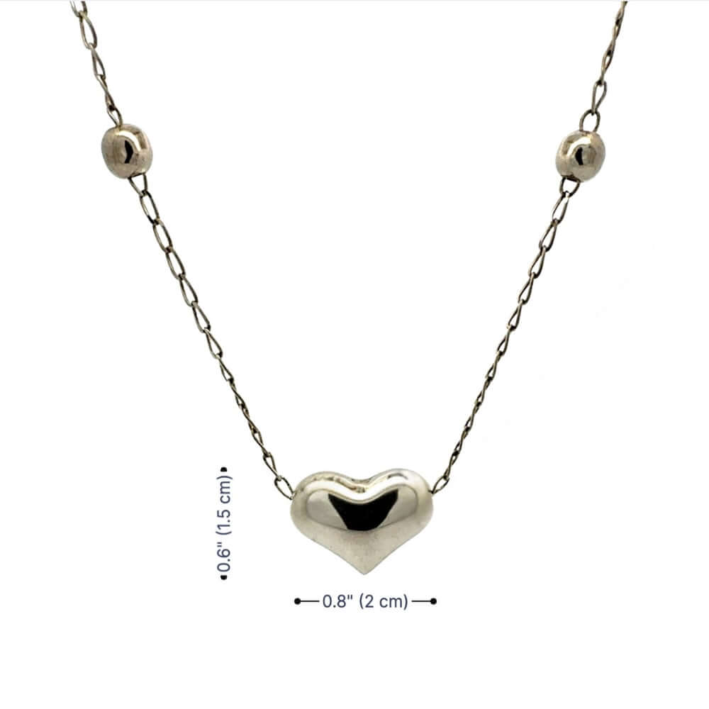 Silver heart-shaped pendant necklace with chain on a white background