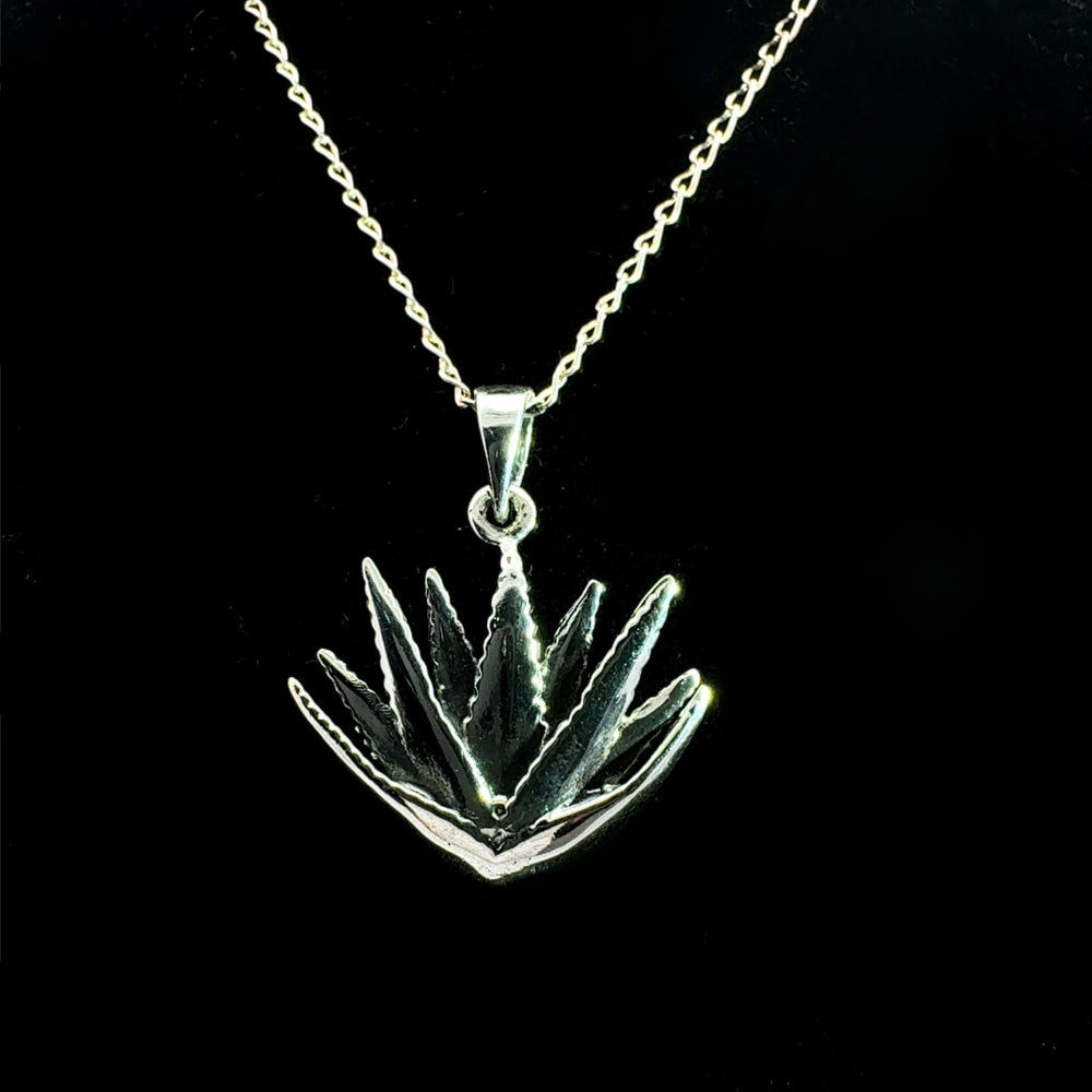 Sterling silver maguey agave plant pendant necklace, black background