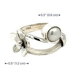 Product dimensions for the handmade silver flower ring by Daniel Gutierrez.
