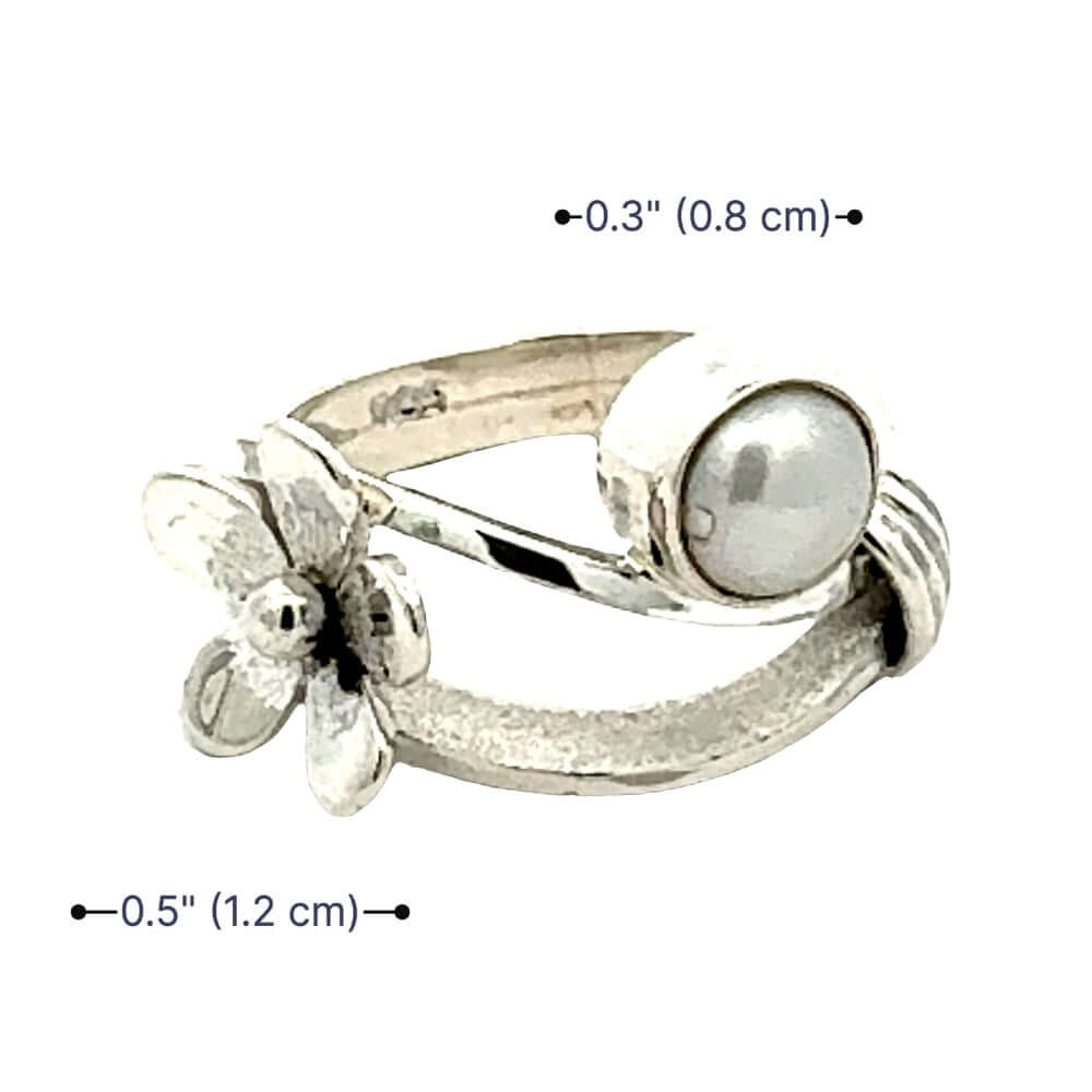 Product dimensions for the handmade silver flower ring by Daniel Gutierrez.