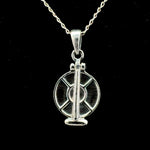 Sterling silver tortillero pendant necklace on cable chain, black background