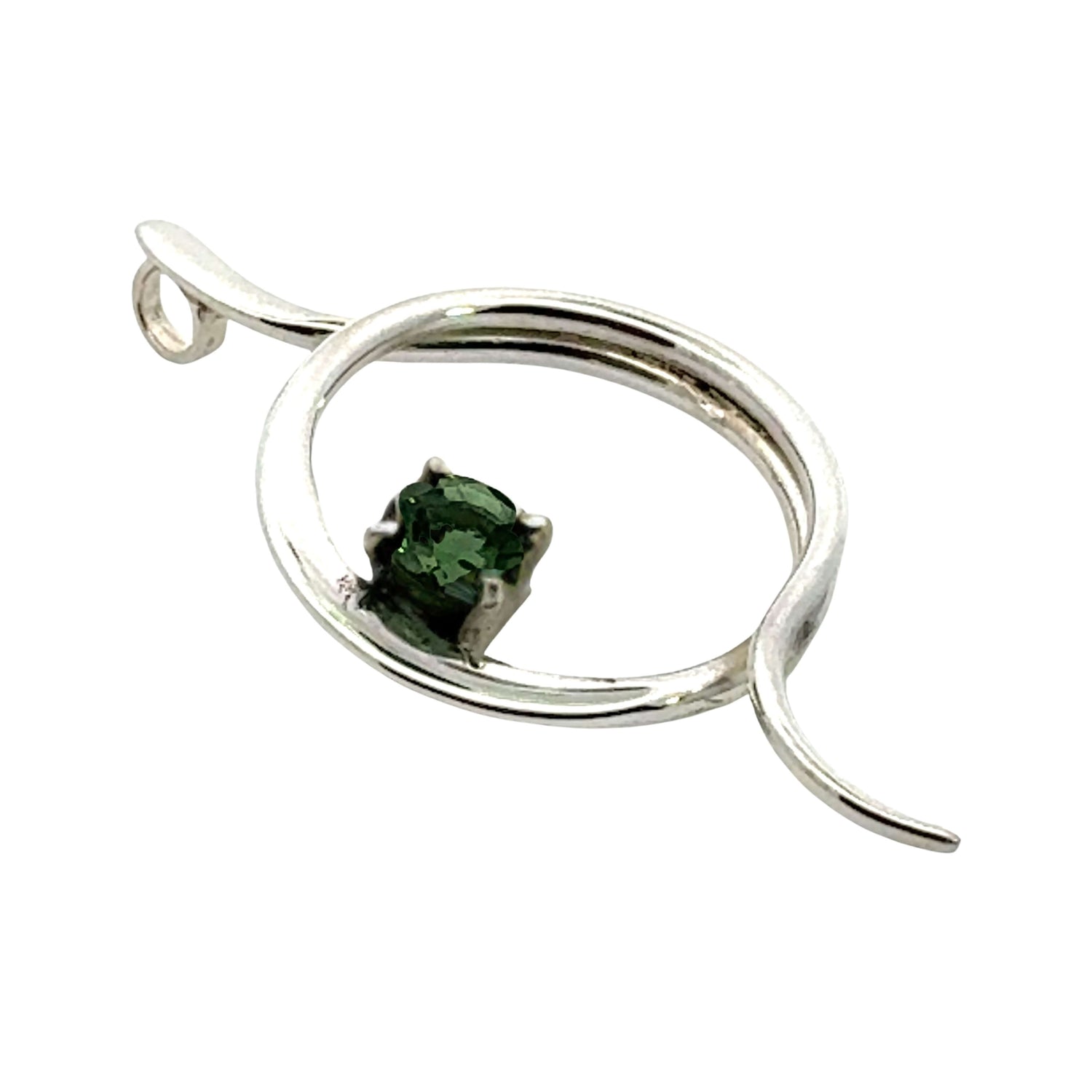 Side profile of a handcrafted sterling silver pendant showing the secure setting of the green tourmaline.