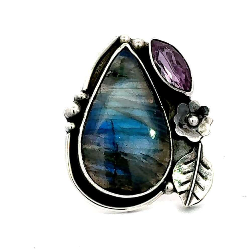 Front view of a handmade 950 silver chunky ring featuring a teardrop labradorite and an oval amethyst stone.