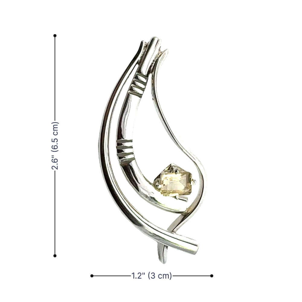 Product dimensions of the artisan silver pendant measuring 2.6 inches in height and 1.2 inches in width.