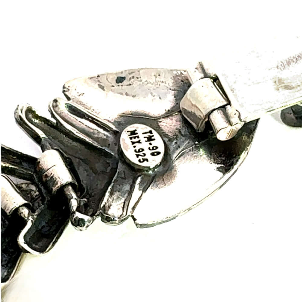 Close-up of TM-90 MEX 925 Taxco registration stamp.