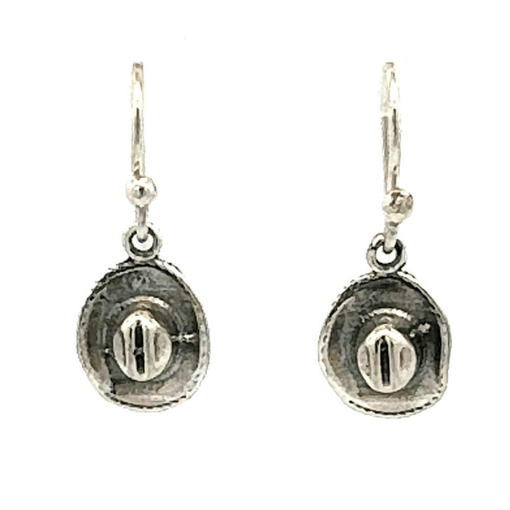 Front view of a pair of handmade 925 sterling silver cowboy small hat hook earrings showcasing their smooth finish and detailed shape.