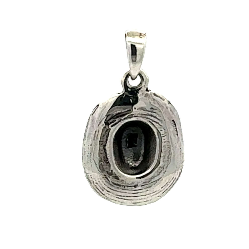 Rear lay of the solid silver pendant demonstrating the clean hollow-back crown design and smooth interior polish.