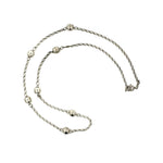 Silver chain necklace on a white background