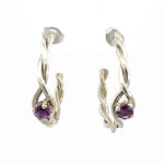 Pair of delicate handmade twisted silver hoop earrings with purple amethyst stones from Taxco Mexico