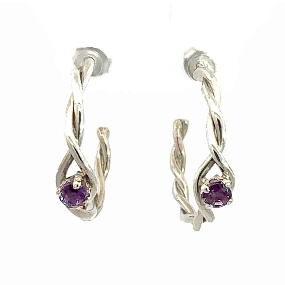Pair of delicate handmade twisted silver hoop earrings with purple amethyst stones from Taxco Mexico
